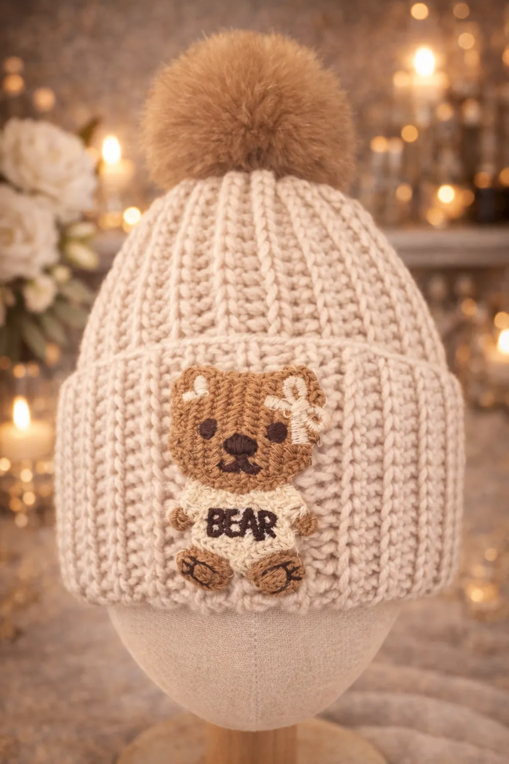 Cream ribbed kids beanie with honey pom pom and crocheted BEAR character on top.